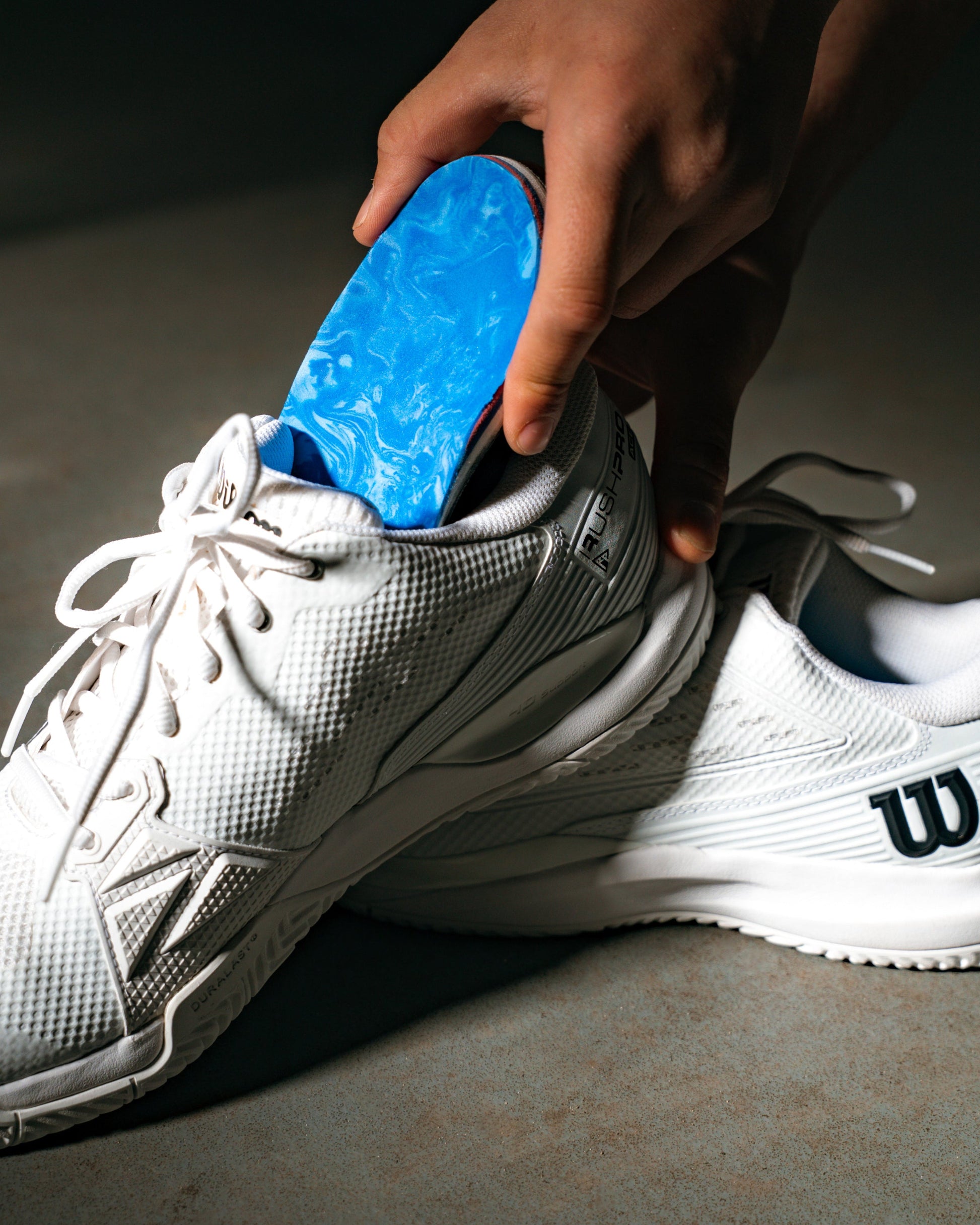 Inlegzool in een Wilson tennisschoen